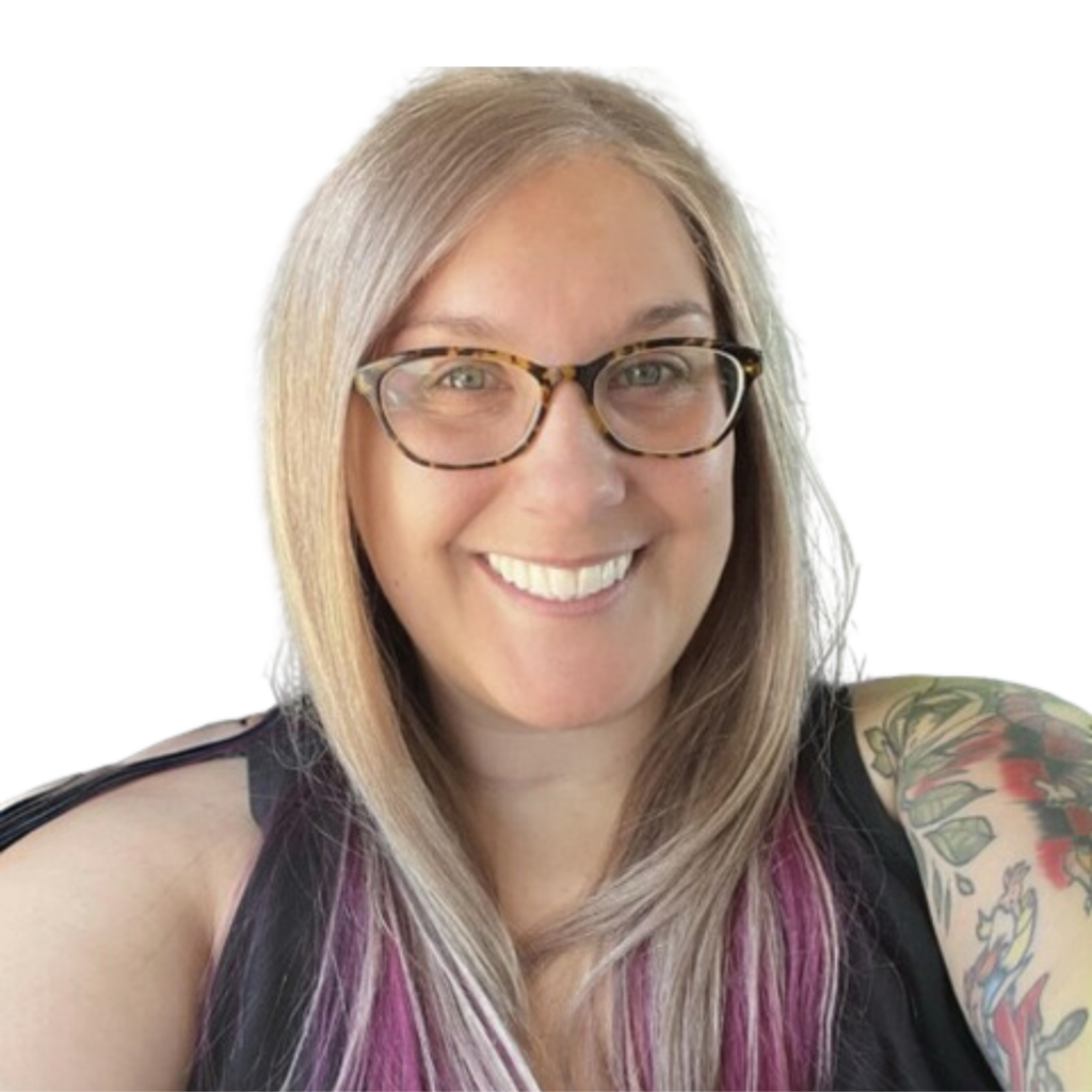 Picture of Courtney Hays, a smiling woman with glasses and long, light brown/blonde hair with purple/pink highlights. She has a tattoo on her shoulder and is wearing a sleeveless black top."